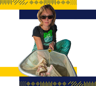 cutout of student doing field testing at the lake