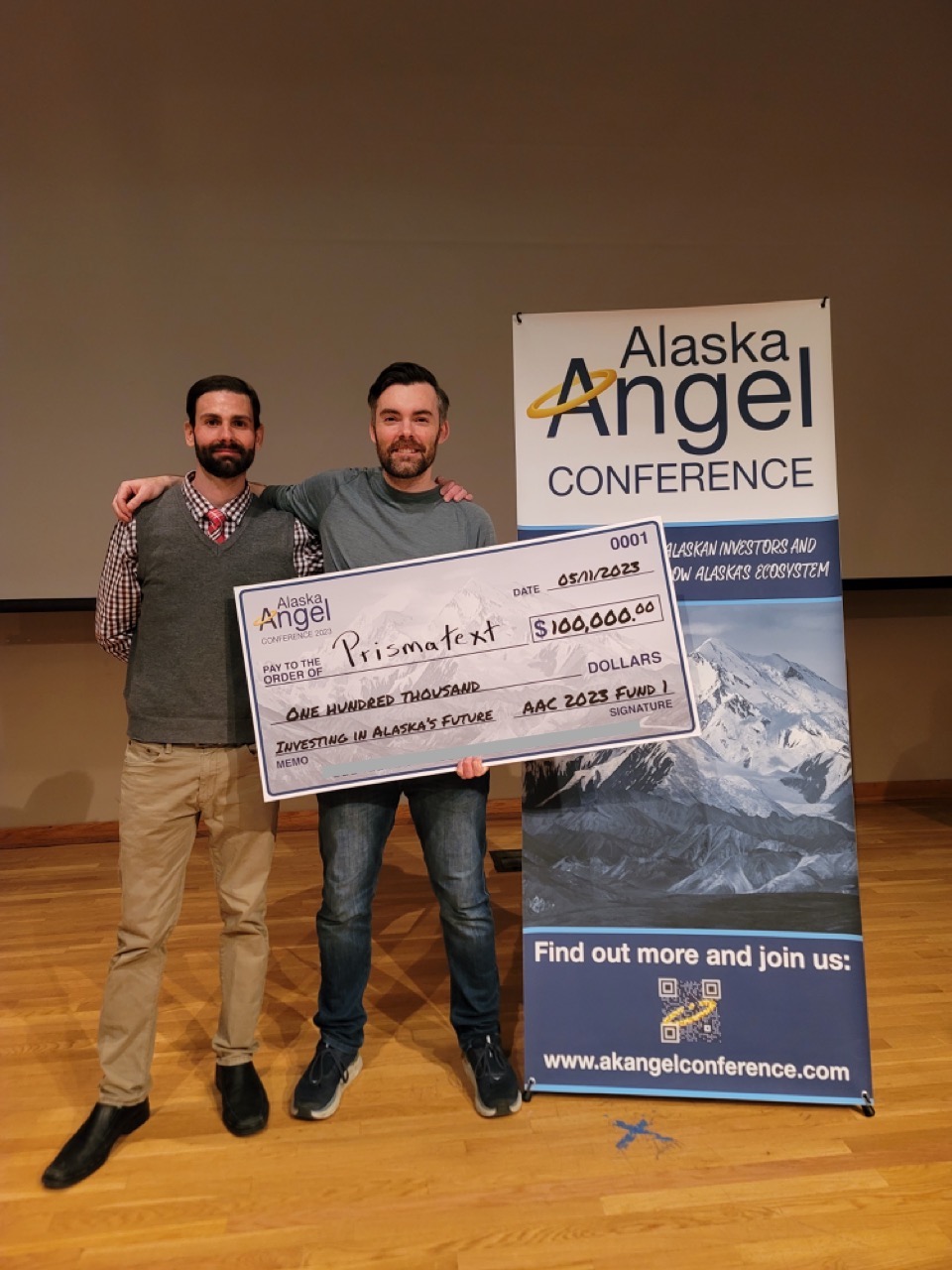 CBSM student Dave Sauter, left, stands with AAC winner, Zak Erving, Prismatext CEO.