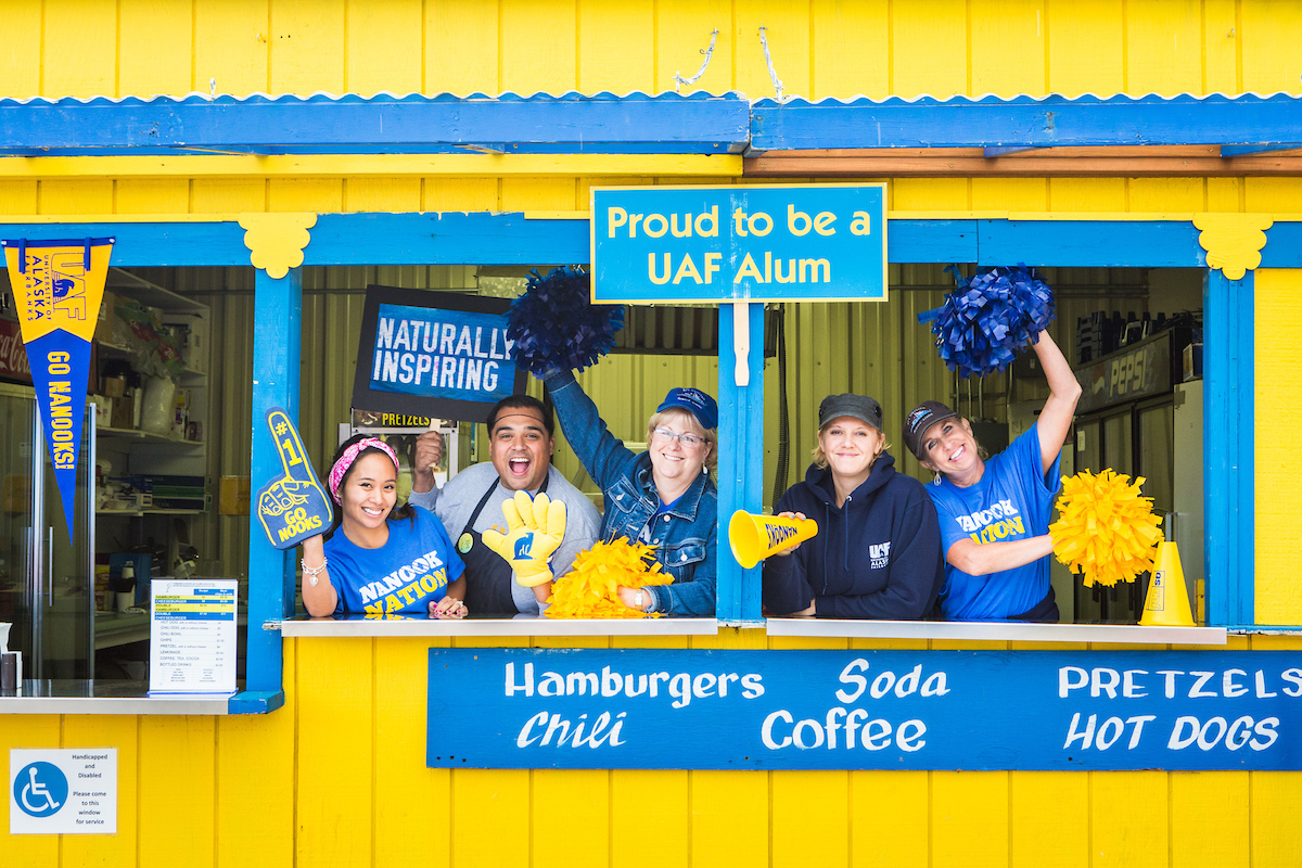 Volunteer positions available at CLA UAF alumni burger booth volunteers pause for a photograph during UAF Day at the Tanana Valley State Fair in August. | UAF Photo by JR Ancheta