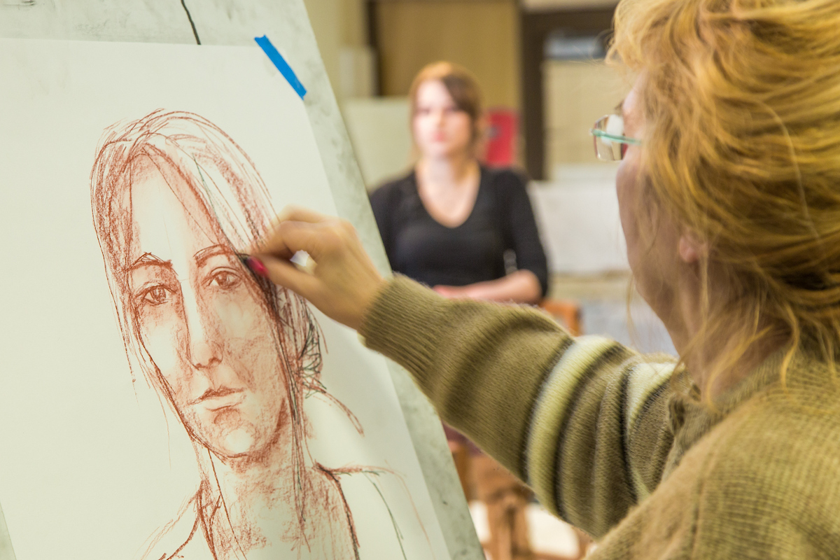 Non Degree Seeking Hana Esop sketches the subject during the portrait painting class in the UAF Fine Arts complex, offered during Wintermester 2014. UAF Photo by Todd Paris