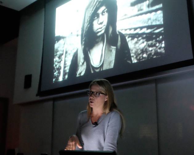 Katie Orlinsky, 2018 Snedden Chair of Journalism at #uafcojo discusses her photojournalism career during a public lecture.