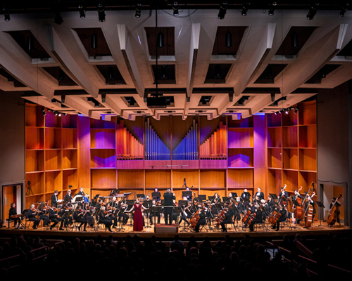 Fairbanks Symphony Orchestra on stage in the Davis Concert Hall. UAF Photo by Leif Van Cise
