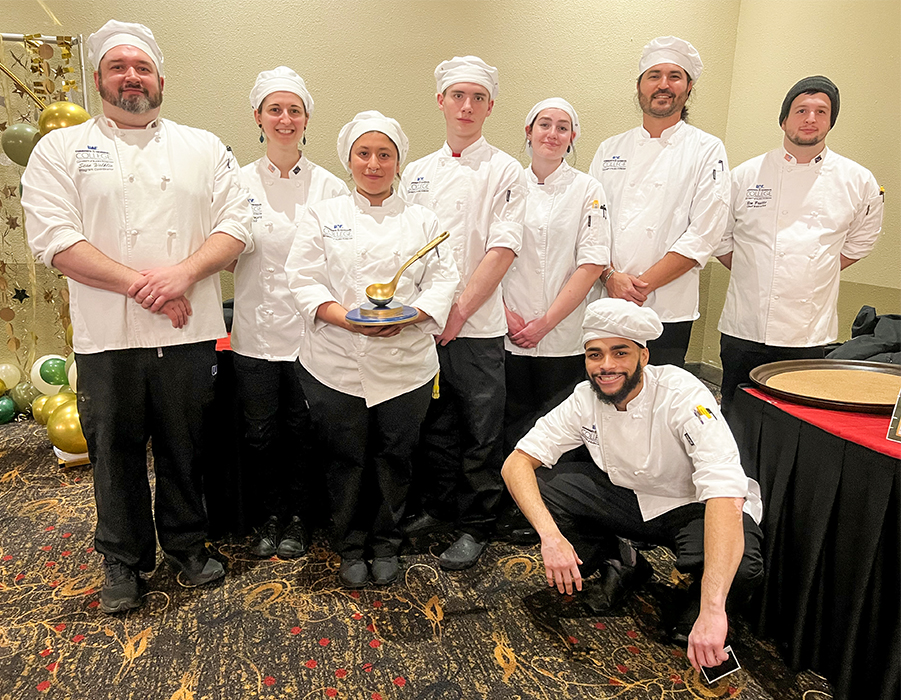 CTC culinary arts and hospitality program students, faculty and staff with the Golden Ladle award at the Westmark Fairbanks Hotel.