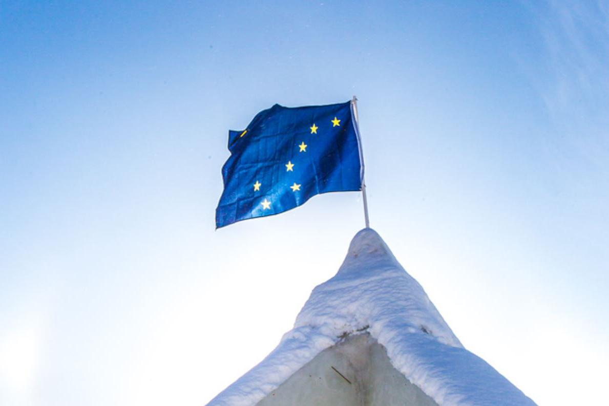 AK flag on ice arch